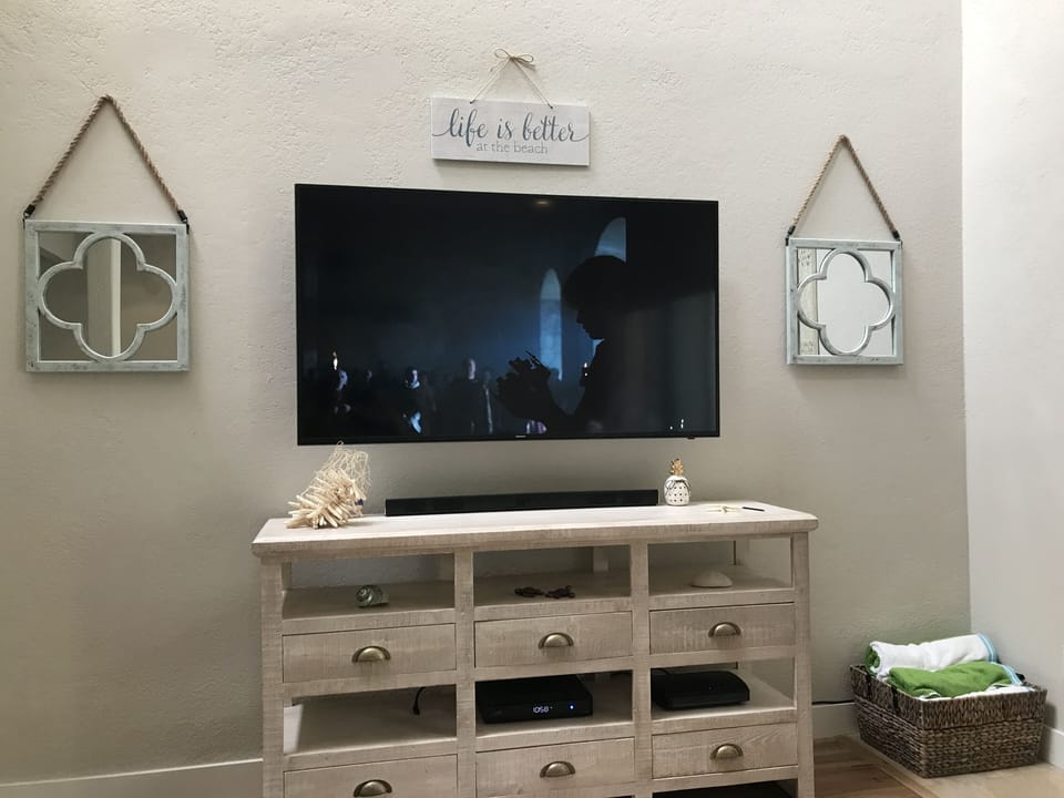 Large 60" flat television with cable and wifi