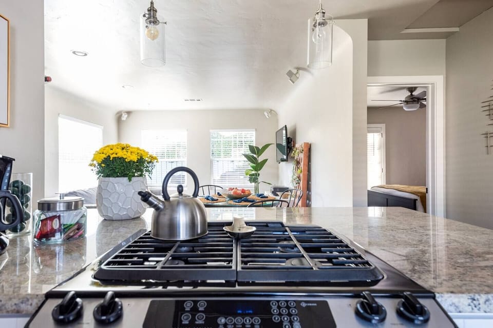 Cook while engaging with family and friends! The open floor layout makes cooking a family affair.