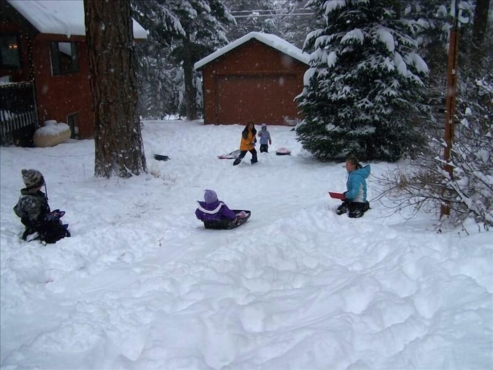 Kid's Sledding Hill Right Side of House (Adults, sled at your own risk:)