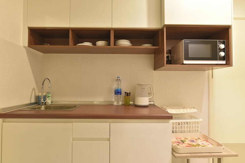 2 Bedroom Apartment | Private kitchen | Fridge, microwave, coffee/tea maker, electric kettle