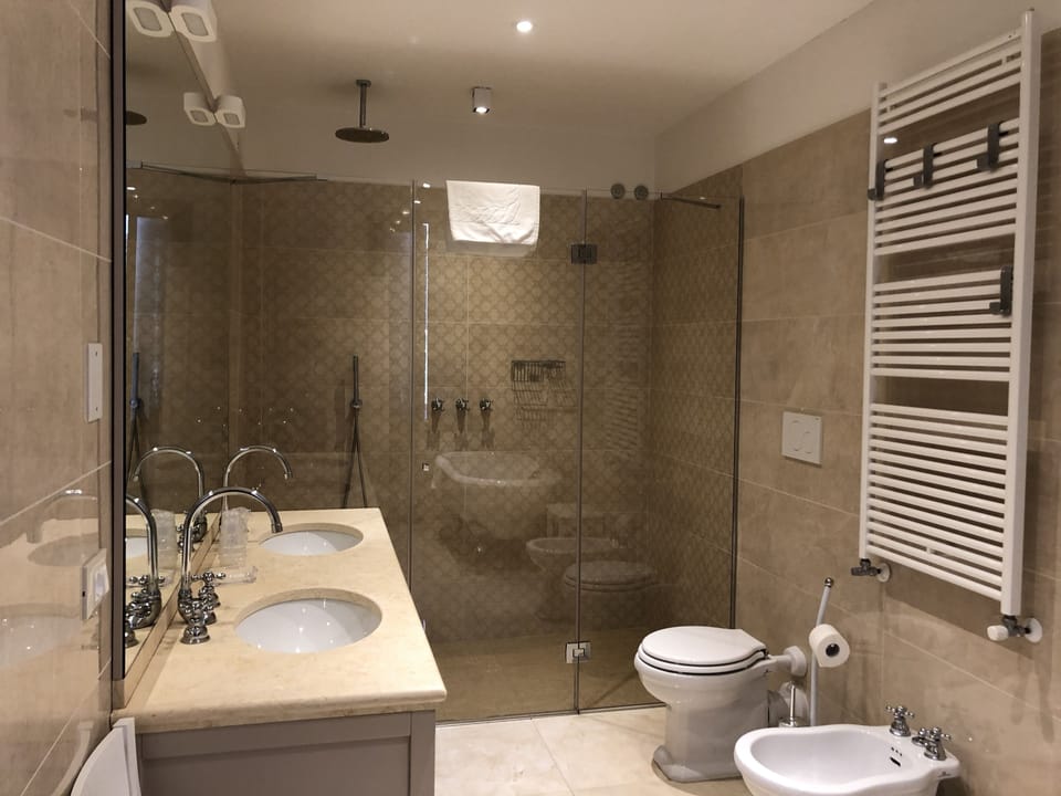 Deluxe Triple Room | 1 bedroom, down comforters, minibar, in-room safe