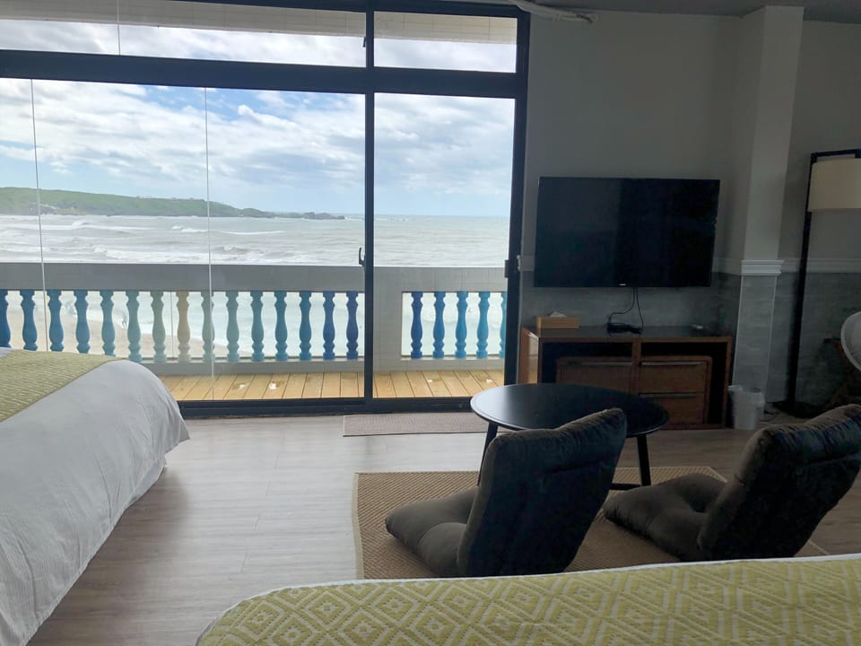 Deluxe Quadruple Room, Beach View | Egyptian cotton sheets, premium bedding, memory foam beds