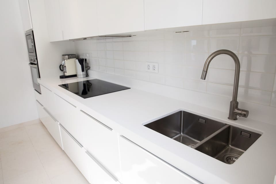 Newly refurbished modern kitchen (microwave, dishwasher, induction hob, oven).