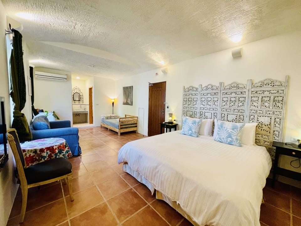 Elite Triple Room, Mountain View | Blackout drapes, soundproofing, free WiFi, bed sheets