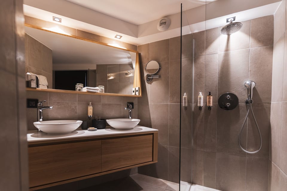 Suite, 2 Bedrooms | Bathroom | Free toiletries, hair dryer, bathrobes, slippers