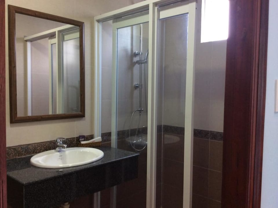 Shower, free toiletries, hair dryer, slippers