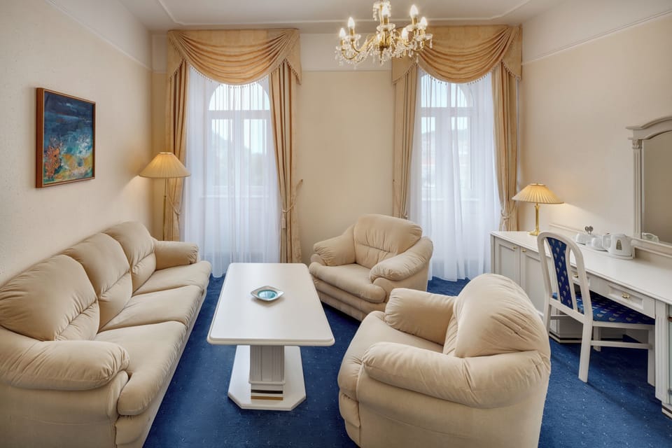 Standard Suite with Wellness and Fitness Access | Living area | Flat-screen TV
