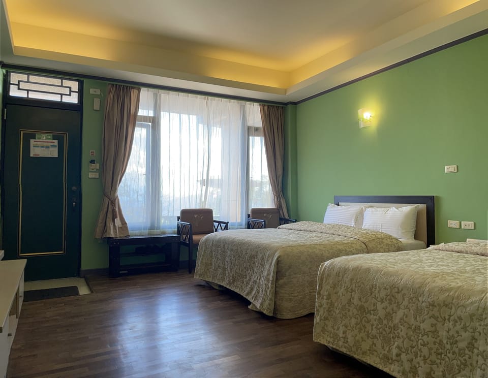 Standard Quadruple Room | Desk, blackout drapes, soundproofing, free WiFi