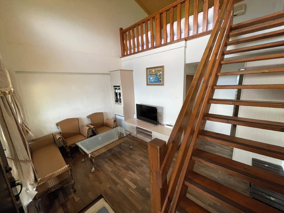 Family Room, Mezzanine | Desk, blackout drapes, soundproofing, free WiFi
