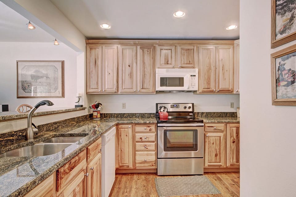 Condo, 2 Bedrooms | Private kitchen | Full-size fridge, microwave, oven, stovetop