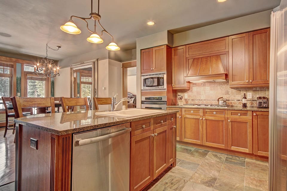 Condo, 2 Bedrooms | Private kitchen | Full-size fridge, microwave, oven, stovetop