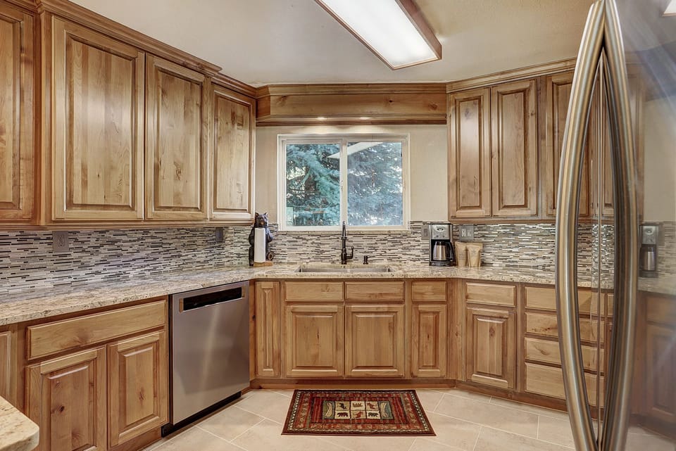 Condo, 2 Bedrooms | Private kitchen | Full-size fridge, microwave, oven, stovetop