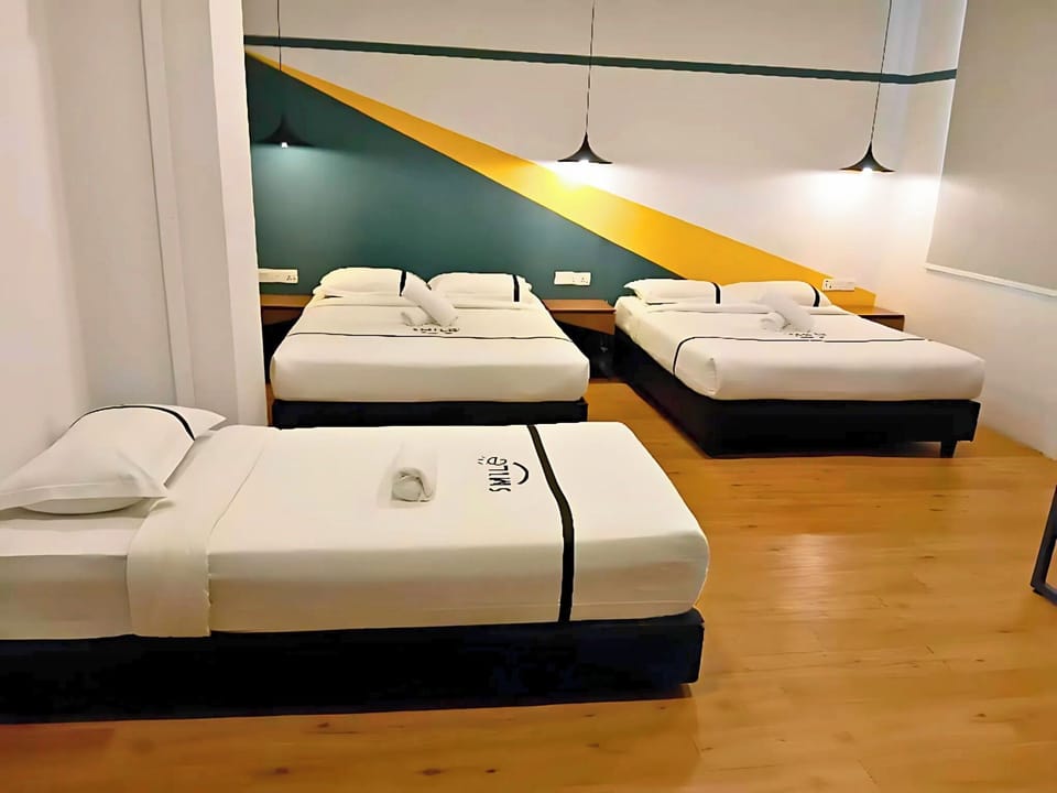 Family Quadruple Room | Desk, iron/ironing board, free WiFi, bed sheets