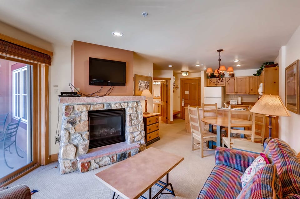 Condo, 1 Bedroom | Living area | Flat-screen TV, DVD player