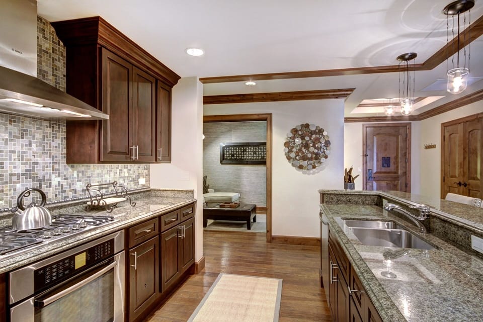 Condo, 2 Bedrooms | Private kitchen | Full-size fridge, microwave, oven, stovetop