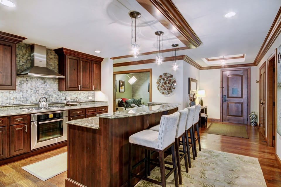 Condo, 2 Bedrooms | Private kitchen | Full-size fridge, microwave, oven, stovetop