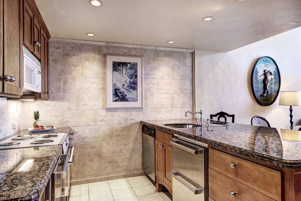 Condo, 2 Bedrooms | Private kitchen | Full-size fridge, microwave, oven, stovetop