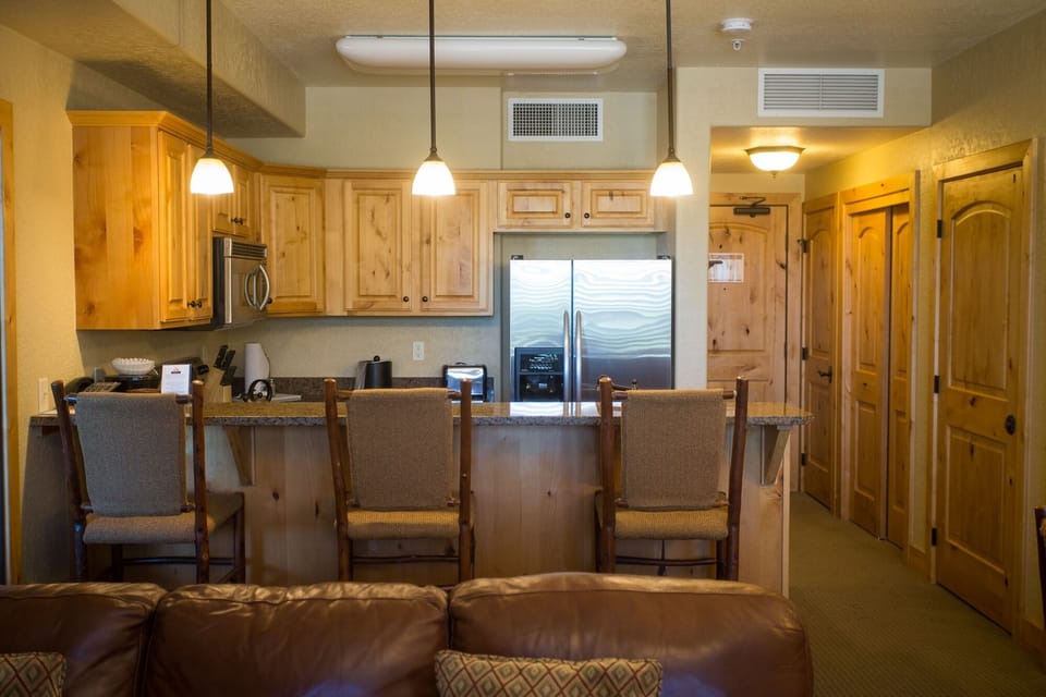 Condo, 2 Bedrooms | Private kitchen | Coffee/tea maker, full-size fridge, microwave, oven