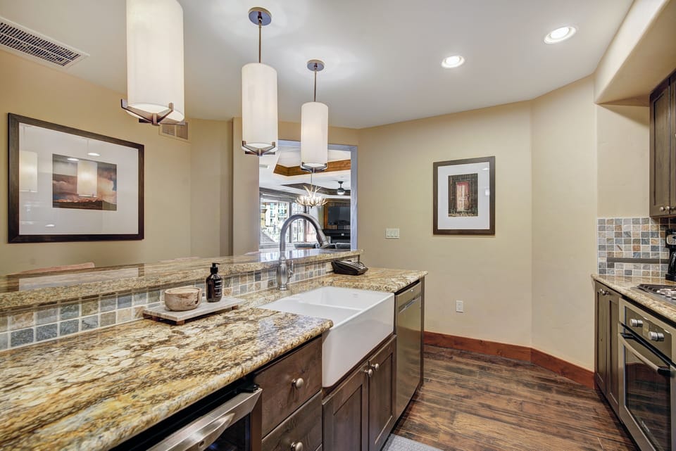 Condo, 2 Bedrooms | Private kitchen | Full-size fridge, microwave, oven, stovetop