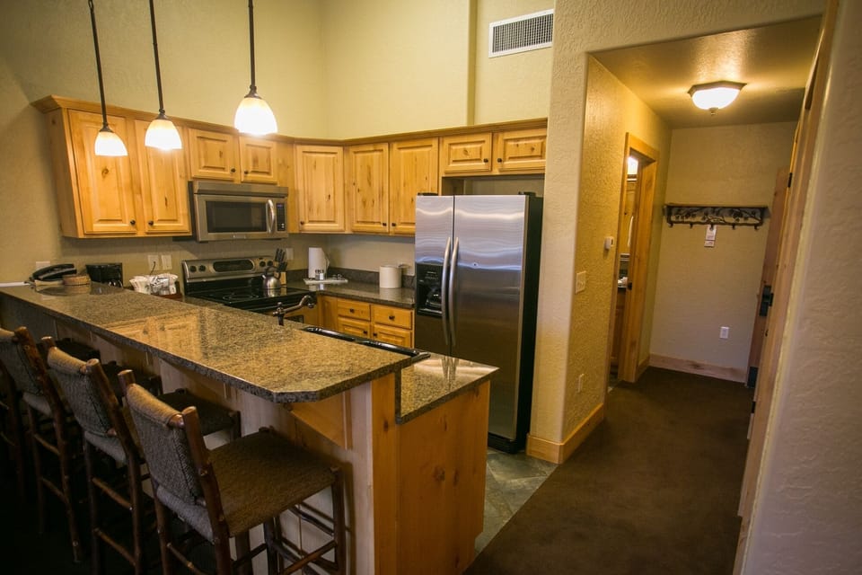 Condo, 2 Bedrooms | Private kitchen | Fridge, microwave, oven, dishwasher