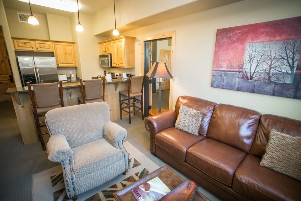 Condo, 1 Bedroom | Living room | Flat-screen TV, fireplace, DVD player