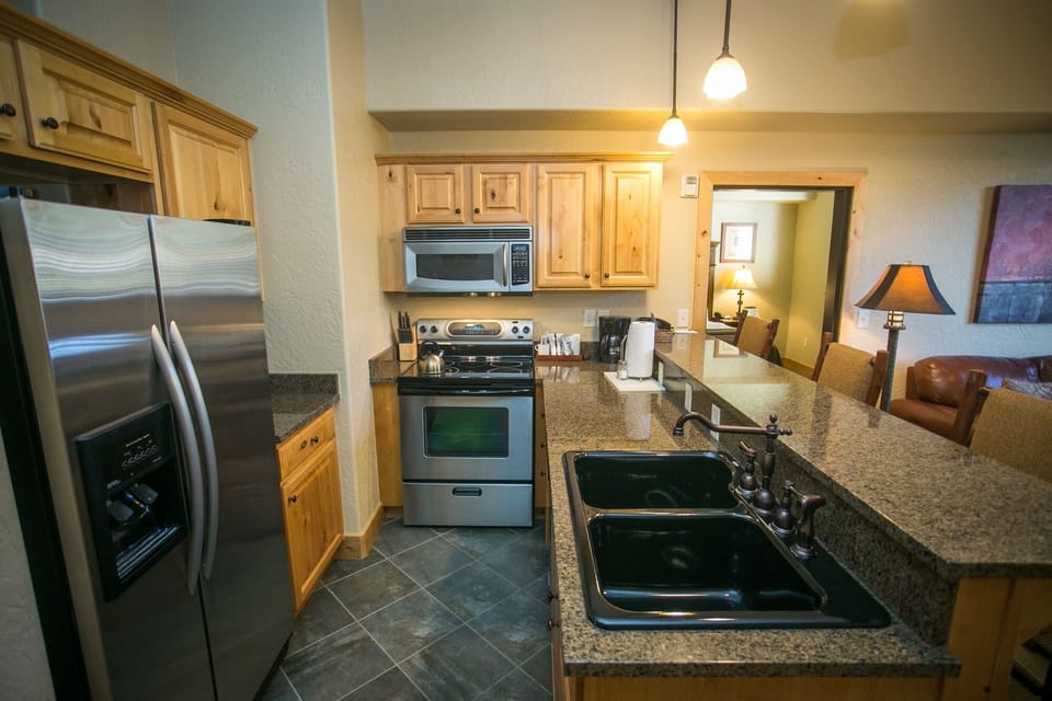 Condo, 1 Bedroom | Private kitchen | Full-size fridge, microwave, oven, stovetop