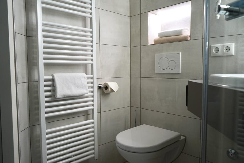 Shower, free toiletries, hair dryer, towels