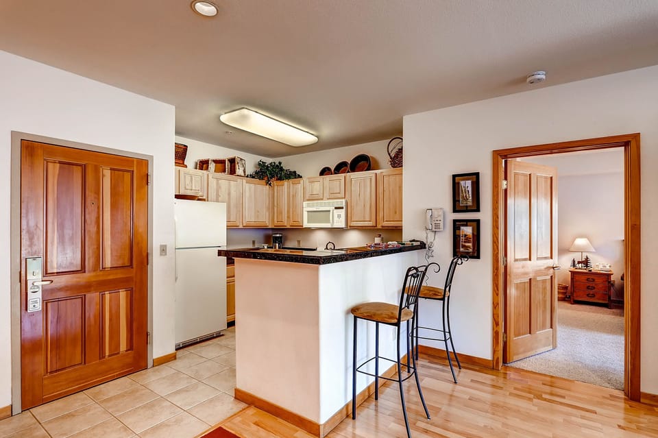 Condo, 2 Bedrooms | Private kitchen | Full-size fridge, microwave, oven, stovetop