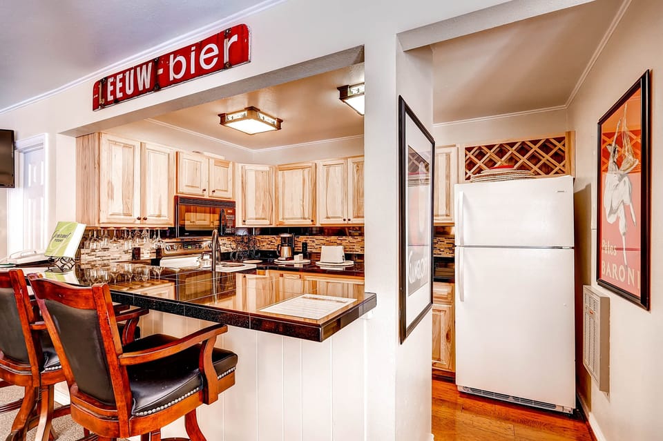 Condo, 2 Bedrooms | Private kitchen | Full-size fridge, microwave, oven, dishwasher