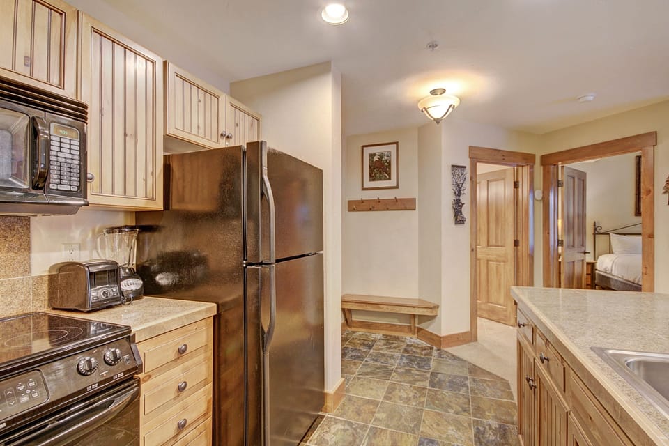 Condo, 1 Bedroom | Private kitchen | Full-size fridge, microwave, oven, dishwasher