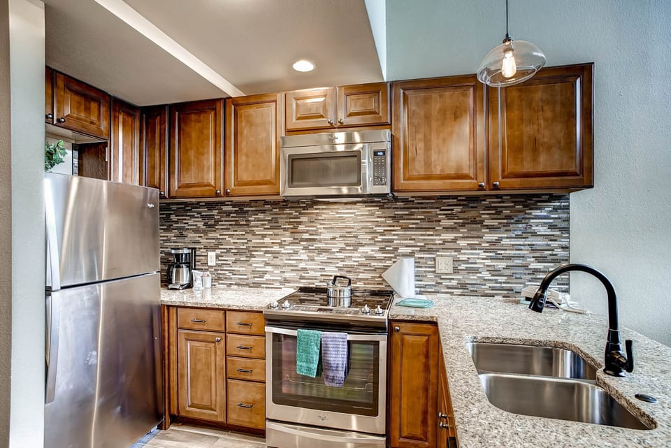 Condo, 1 Bedroom | Private kitchen | Full-size fridge, microwave, oven, stovetop