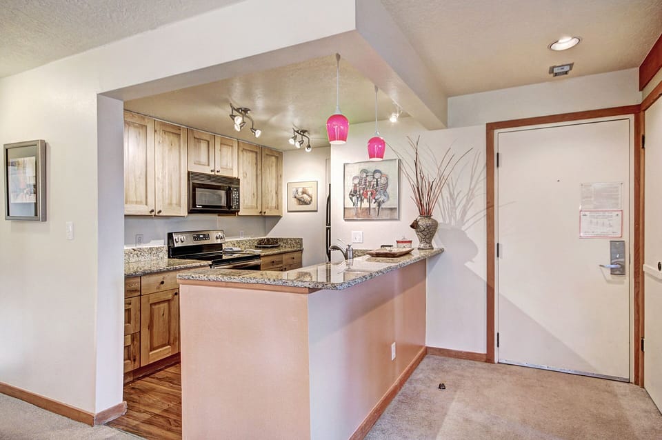 Condo, 2 Bedrooms | Private kitchen | Full-size fridge, microwave, oven, stovetop