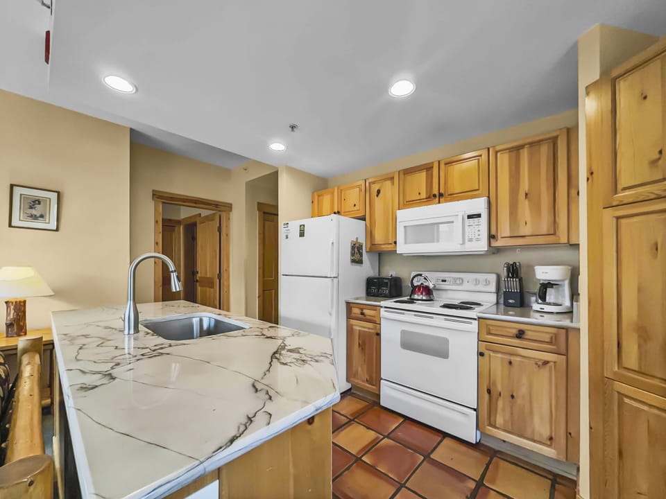 Condo, 2 Bedrooms | Private kitchen | Fridge, microwave, oven, dishwasher