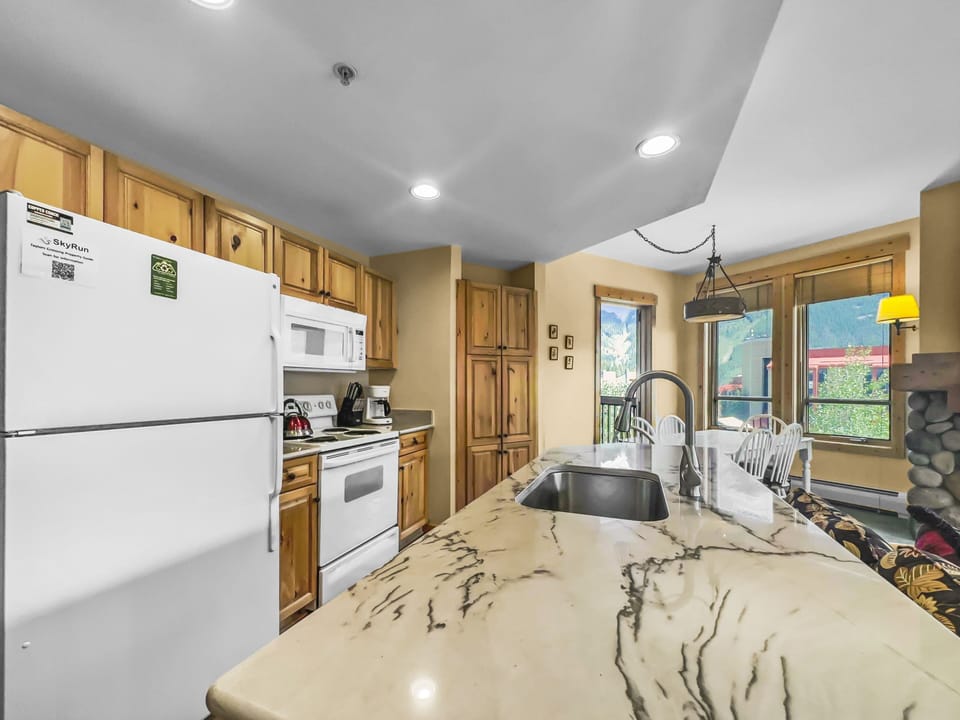 Condo, 2 Bedrooms | Private kitchen | Fridge, microwave, oven, dishwasher