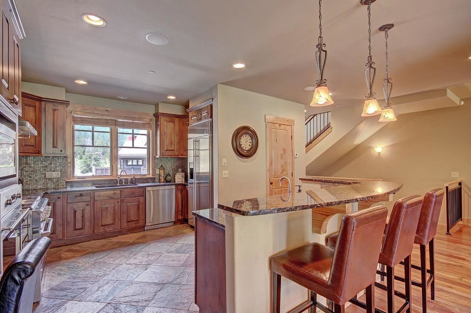 Townhome, 4 Bedrooms | Private kitchen | Full-size fridge, microwave, oven, stovetop