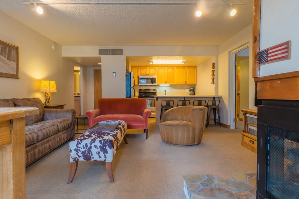 Condo, 2 Bedrooms | Living room | 46-inch flat-screen TV with cable channels, TV, DVD player