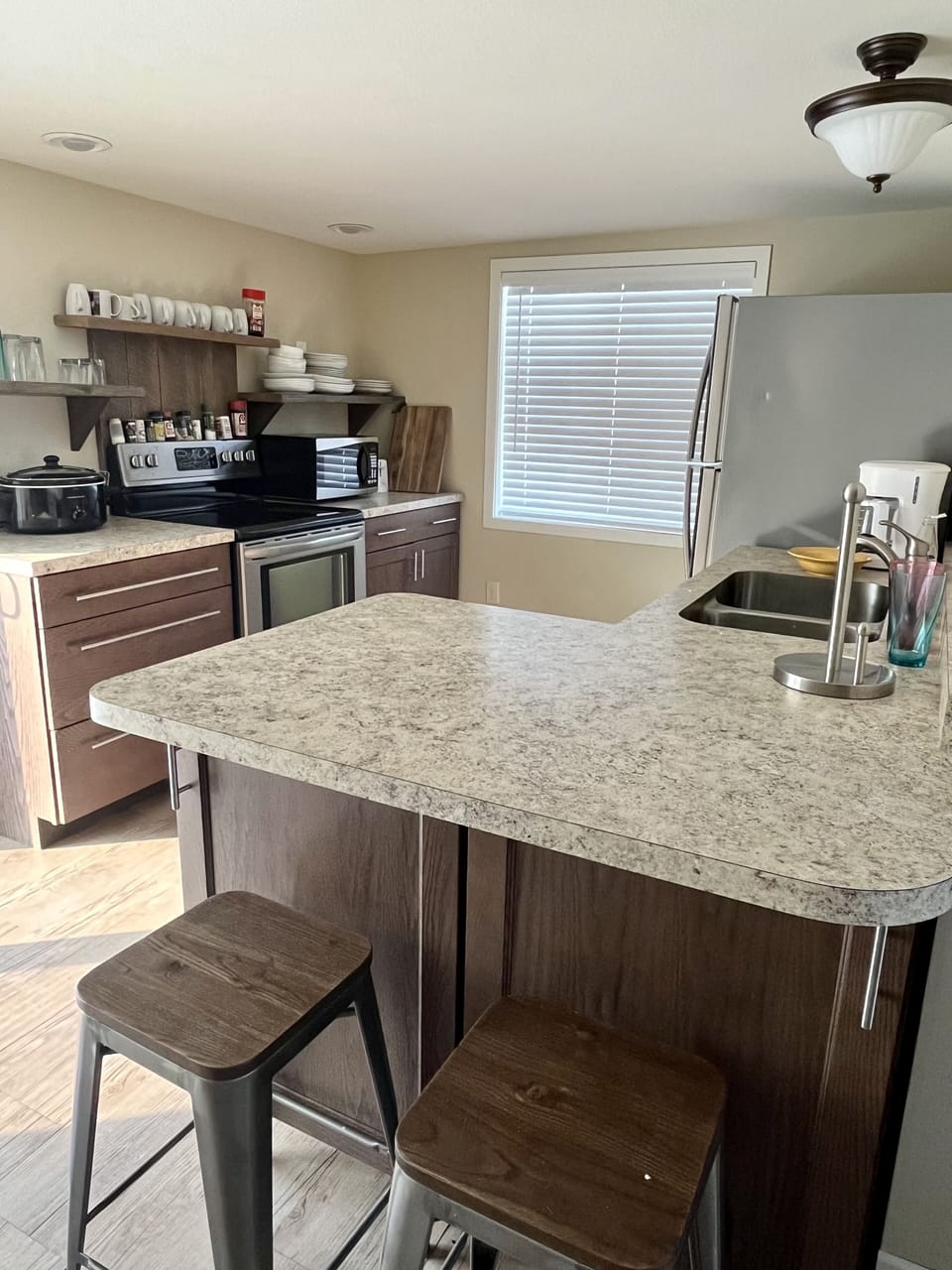 Kitchen with sliding glass doors to back patio. 