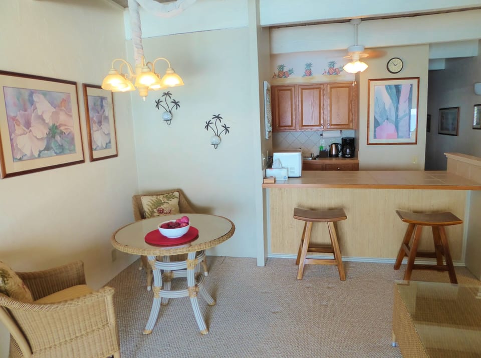 Indoor dining table and stool for sitting at kitchen counter area.