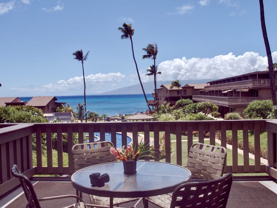 A beautiful view of Keoni Nu'i bay and  Moloka'i while you enjoy your
 coffee.