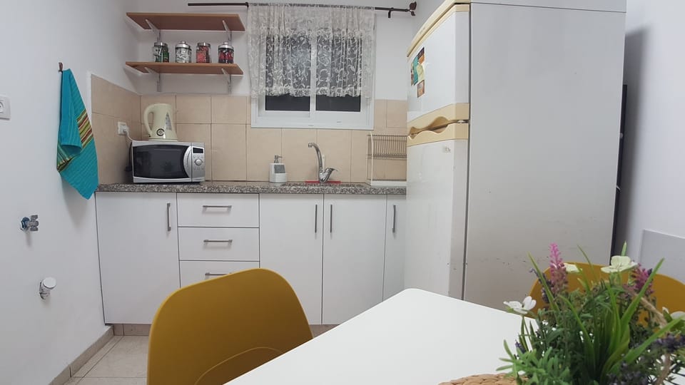 Classic Apartment, 2 Bedrooms | Private kitchen | Coffee/tea maker, full-size fridge, microwave, stovetop