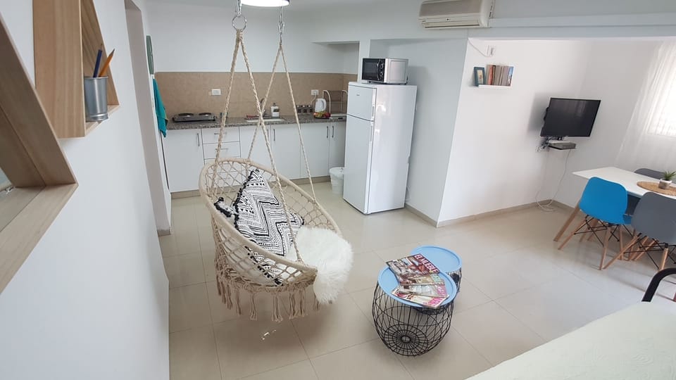 Design Apartment, 1 Bedroom | Private kitchenette | Coffee/tea maker, full-size fridge, microwave, stovetop