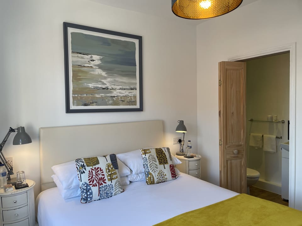 Double Room | Blackout drapes, iron/ironing board, free WiFi, bed sheets