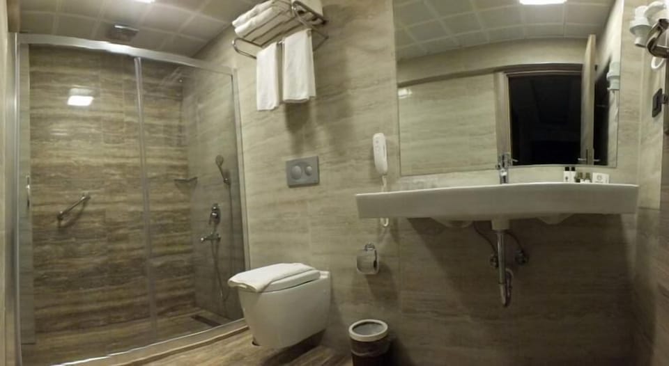 Shower, free toiletries, hair dryer, towels