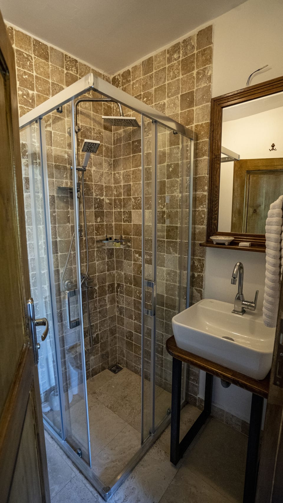 Shower, free toiletries, hair dryer, slippers