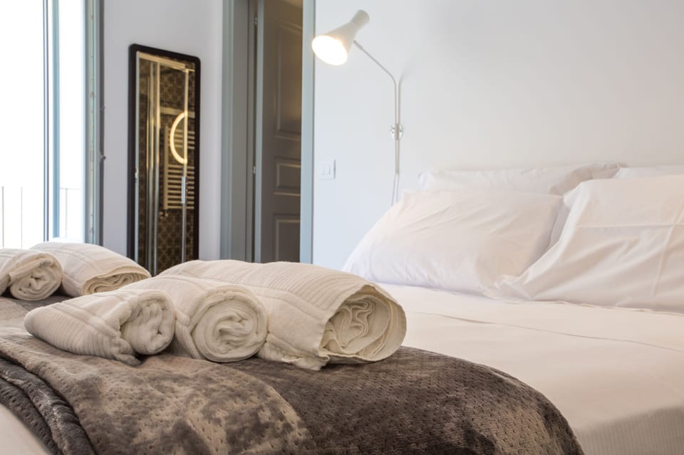 Family Triple Room | Premium bedding, minibar, in-room safe, individually furnished