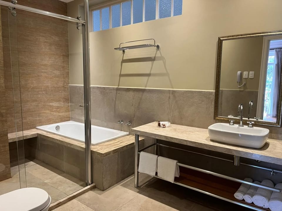 Superior Studio Suite, 1 Bedroom, Garden View | Bathroom | Free toiletries, hair dryer, towels, soap
