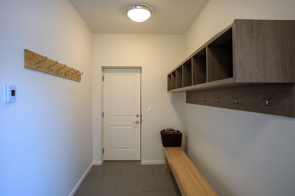 Mudroom w/ bench area, ski clothes racks, helmet cubbies just off the garage.
