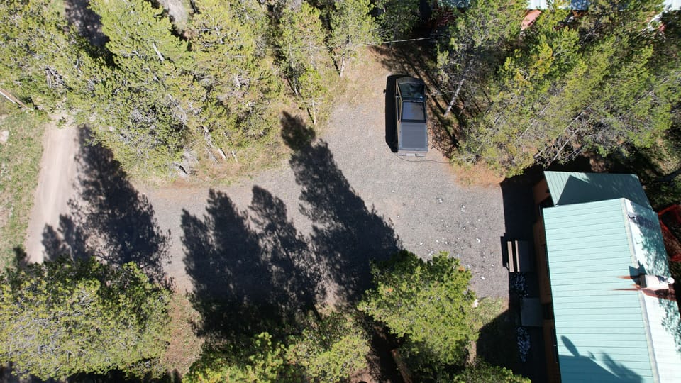 Top view of parking area(with FREE EV charging) and Cozy Cabin.