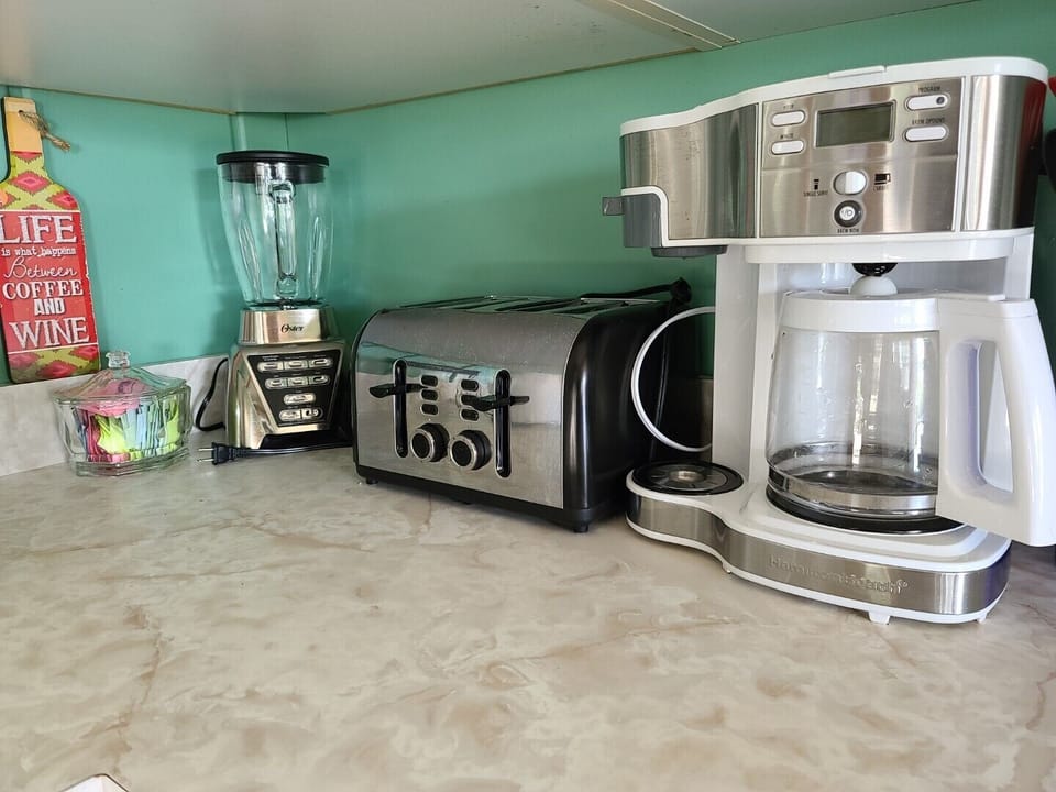 Modern appliances. Drip style coffee maker. Make a cup or make a pot.