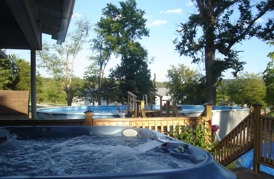Soak in the hot tub after a long day tailgating or a dip in the pool.